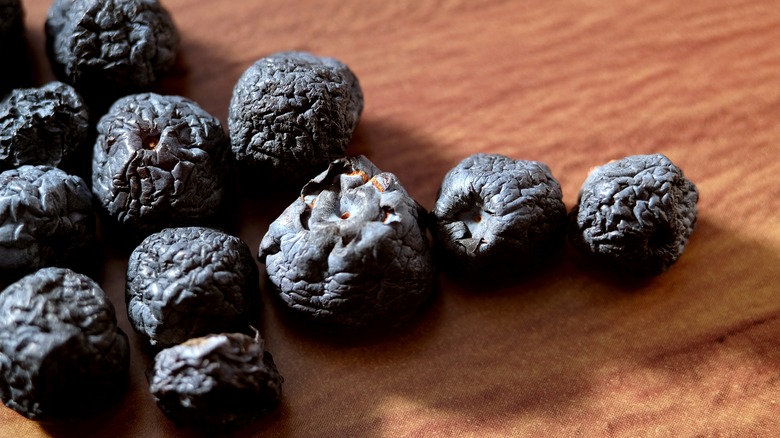 Blueberries with wrinkled and broken skins