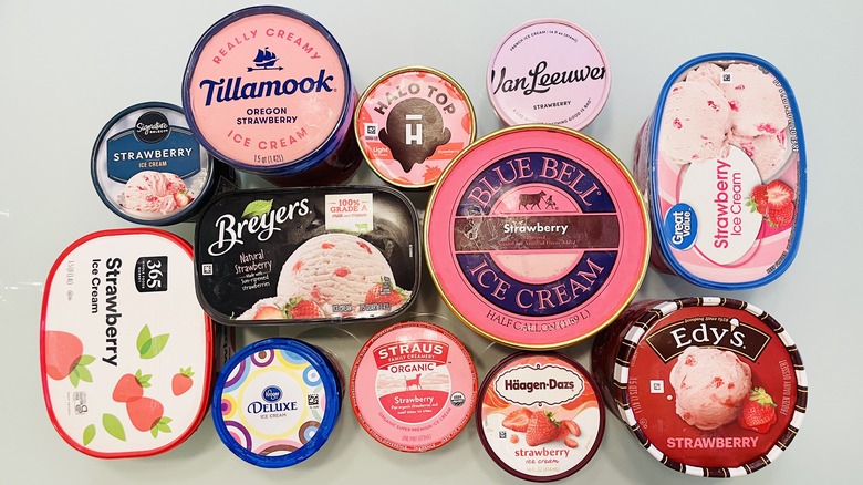 Overhead view of cartons of strawberry ice cream from different brands