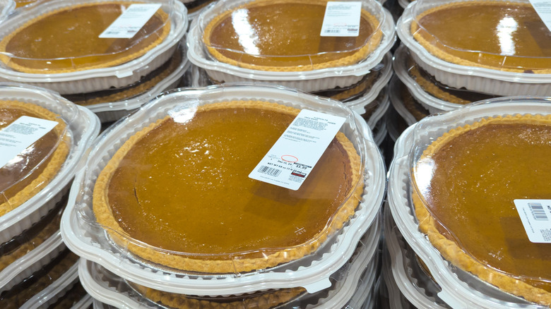 Costco pumpkin pies stacked in containers