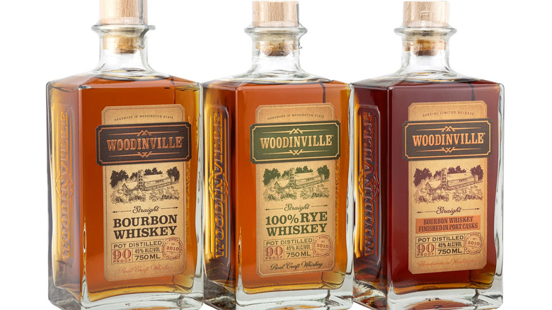 three bottles of Woodinville whiskey