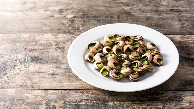 A bowl of herbed escargot