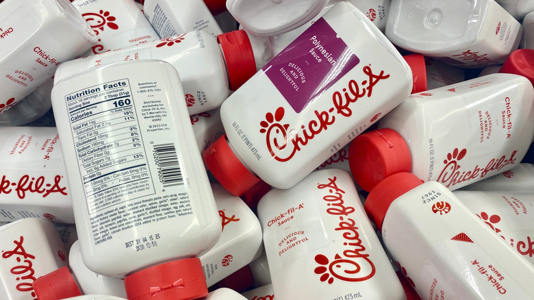 Bin full of different Chick-fil-A sauces