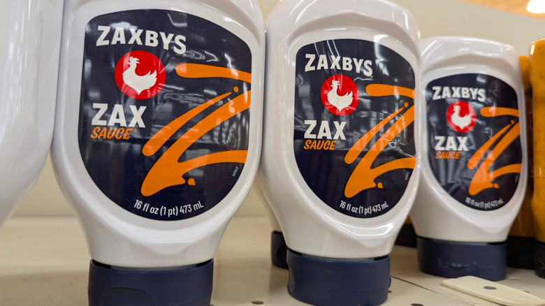 Bottles of Zaxby's Zax Sauce on a shelf