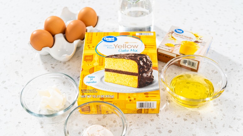 Boxed cake mix with baking ingredients