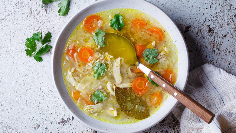 A bowl of chicken noodle soup.