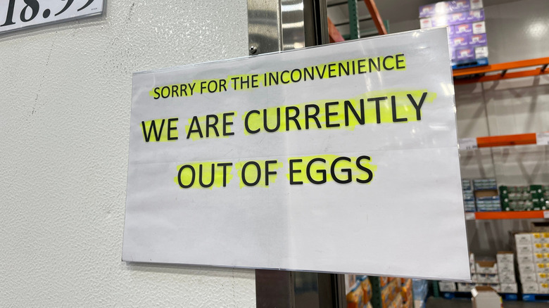 A sign at a Costco location detailing that the warehouse is currently out of eggs