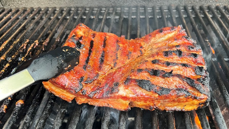 seared pork belly on grill