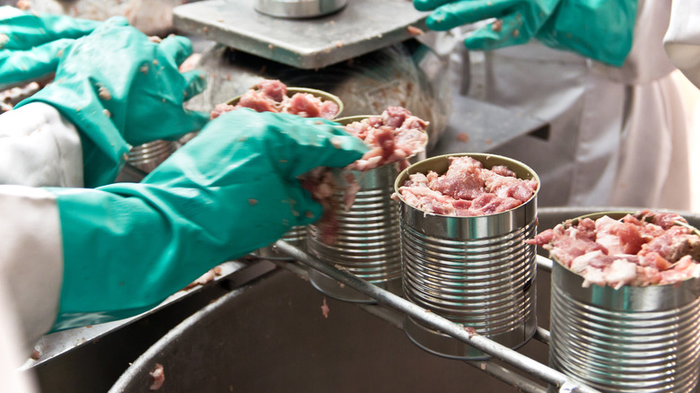 Canned meat on an assembly line