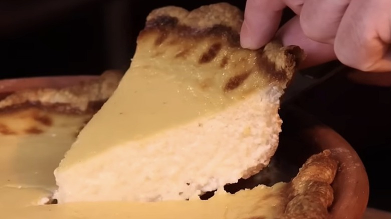 Slice of Marlborough pie as its about to be plated
