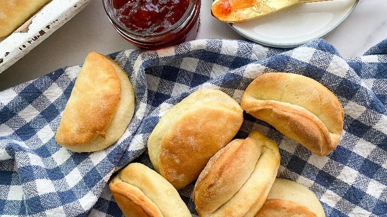 parker house rolls on blue gingham cloth