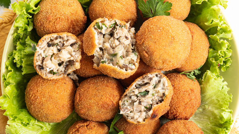 Turkey croquettes on bed of lettuce