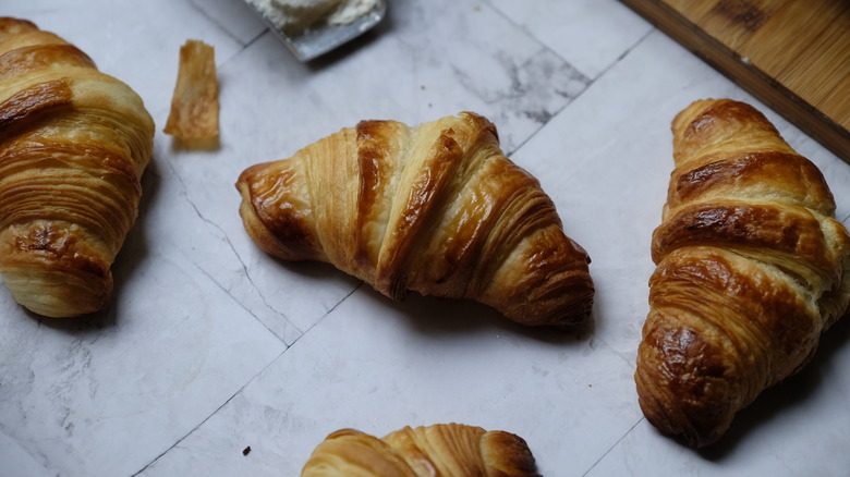 baked croissants on counter