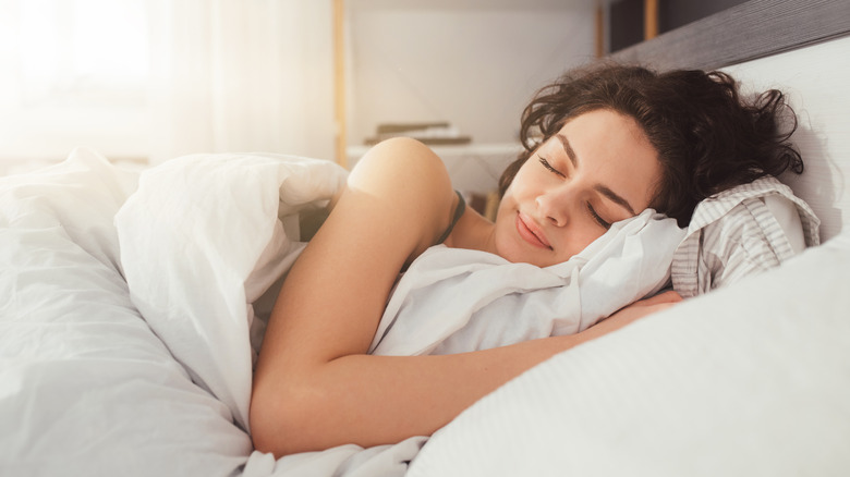 woman sleeping in bed
