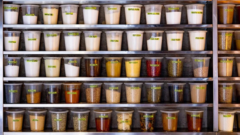 Shelves of labeled deli containers