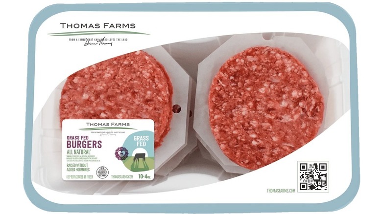 Package of ground beef burger patties divided in two stacks