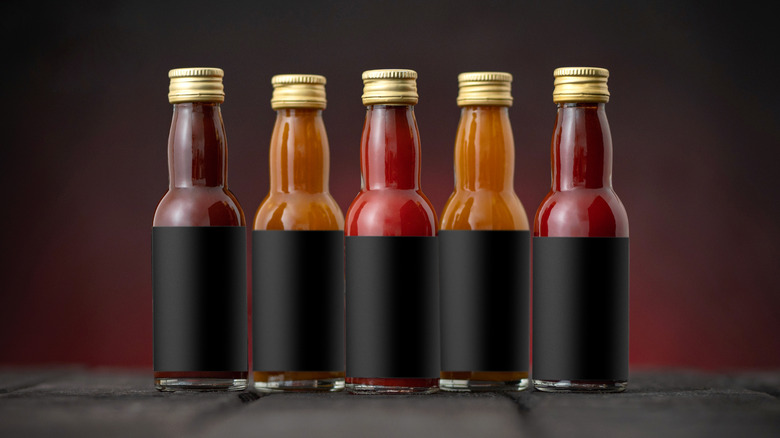 An assortment of unlabeled barbecue sauces