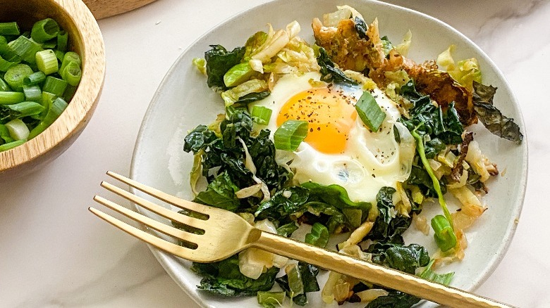 serving of green shakshuka on plate