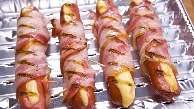 Hot dogs stuffed with cheese and wrapped in bacon