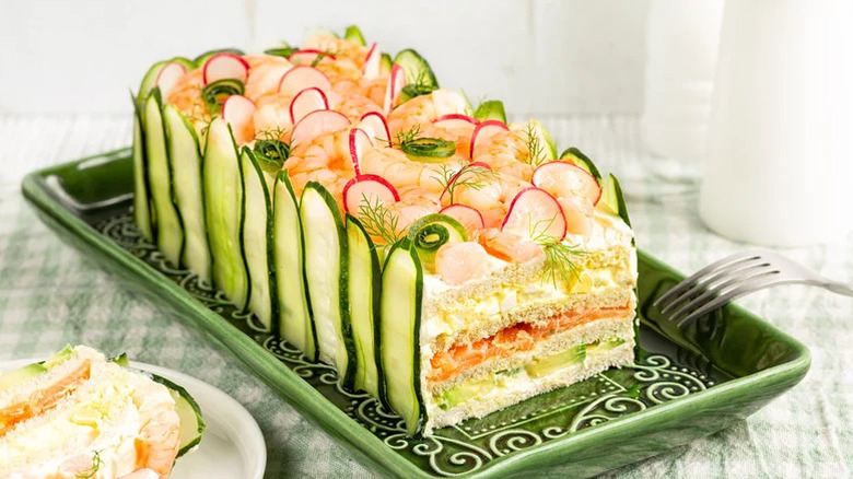 A frosted sandwich loaf with layers