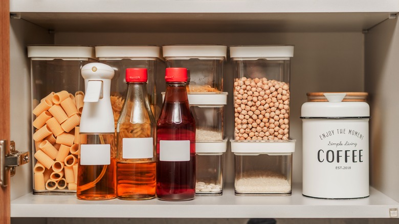 Organized pantry with labeled food zones
