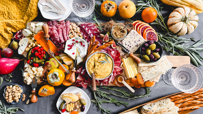 Thanksgiving charcuterie board with pumpkin-sage hummus
