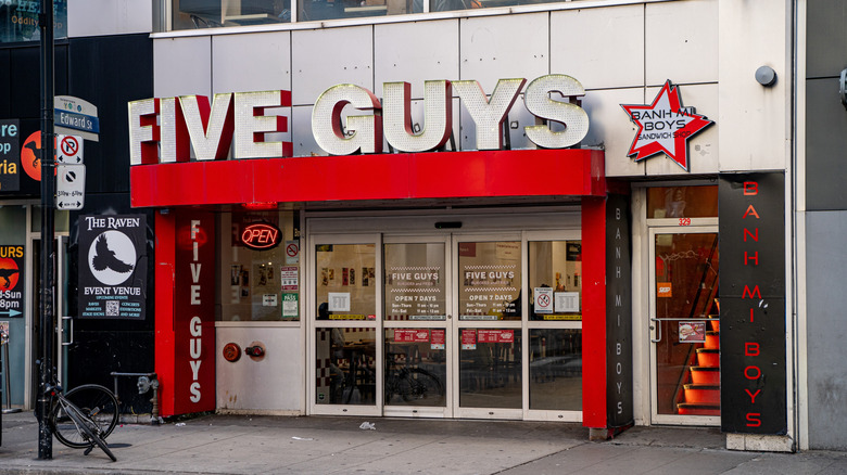 Exterior shot of a Five Guys restaurant