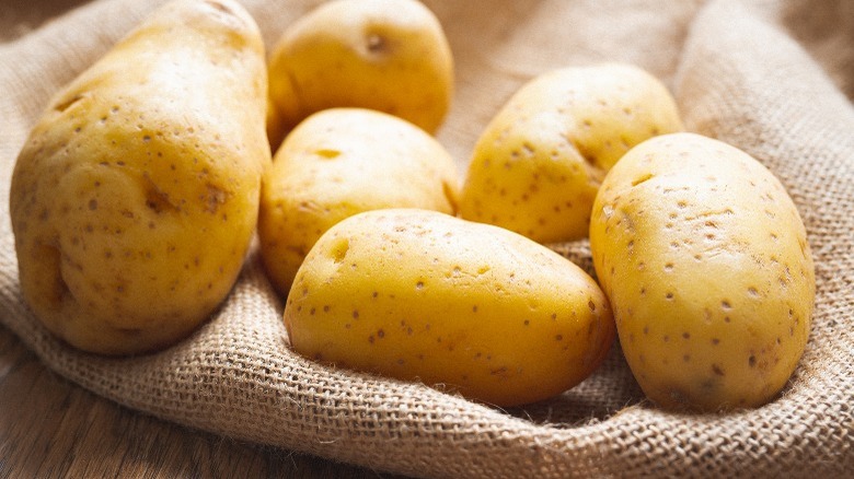 Yukon Gold potatoes on a cloth