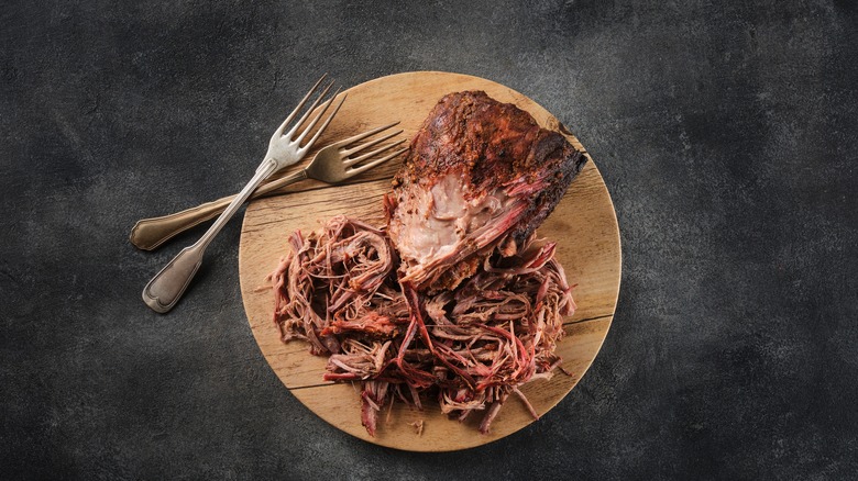 pulled pork on wooden board