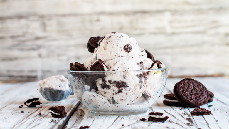cook crumbles in ice cream and a few cookies and crumbles on the table
