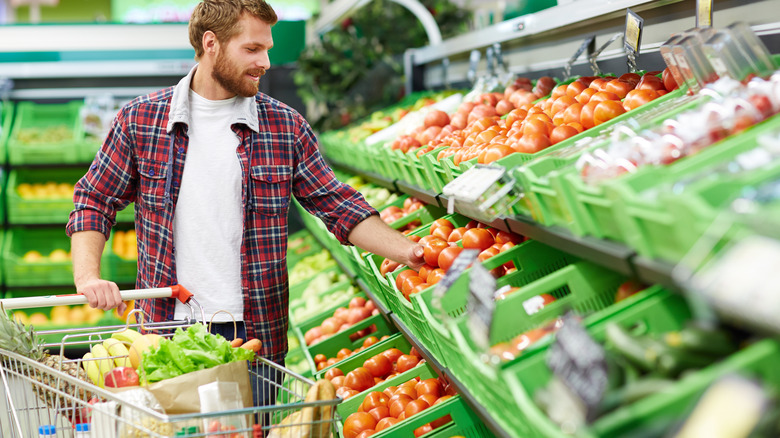 person shopping for produce