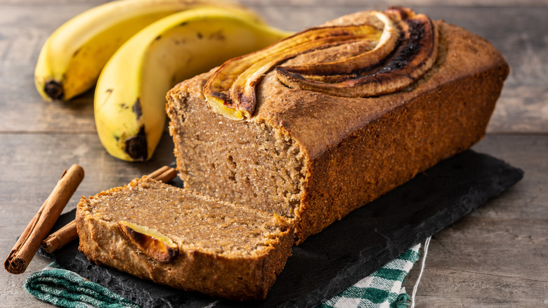 Banana bread on a rustic stone platter