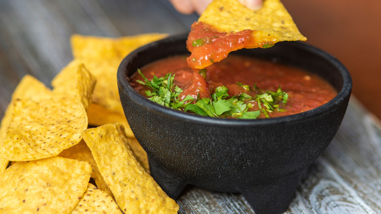 close up of salsa and chips