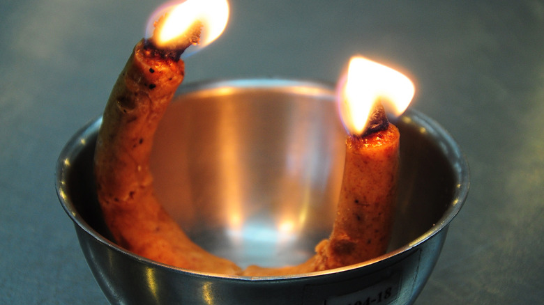 Lighted tian op candle 