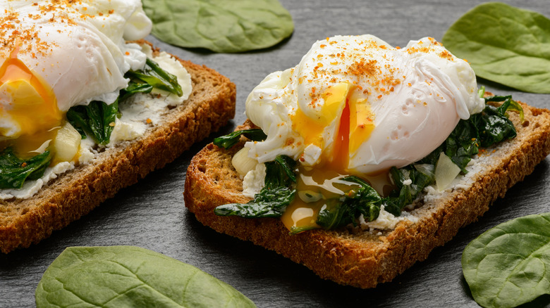 Poached eggs on toast with spinach