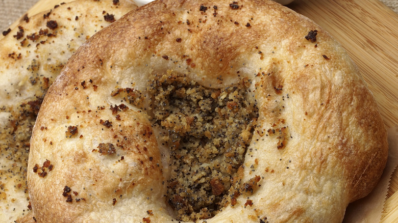 filled bialy on wooden board