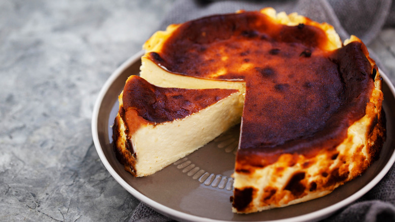 a basque cheesecake on a plate