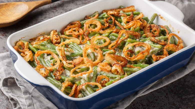 Green bean casserole in a blue casserole dish