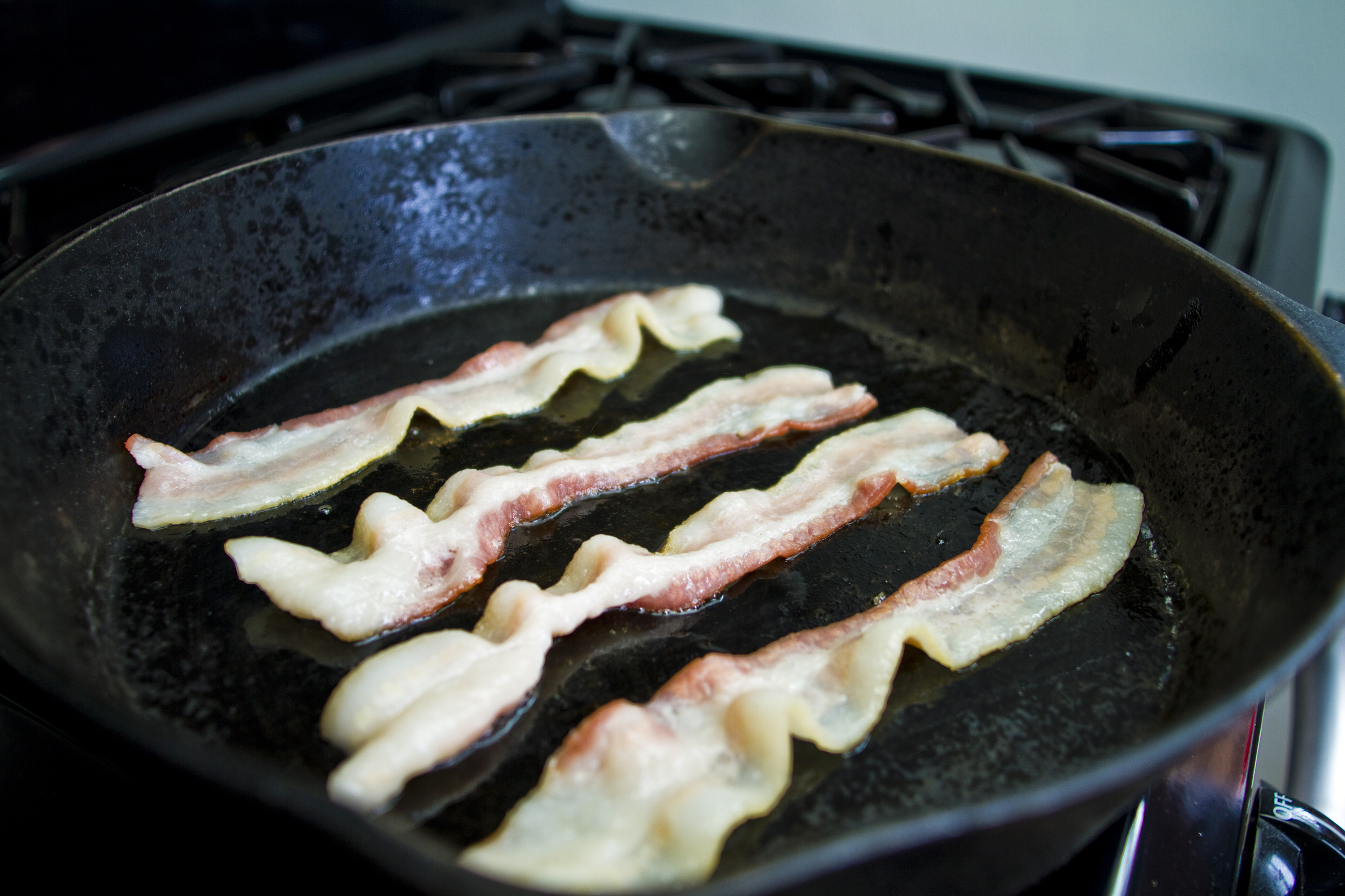 Bacon in a frying pan